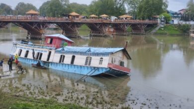 Houseboat Partially Sinks in Jhelum Amid Rain in Srinagar’s Rajbagh Area