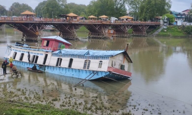 Houseboat Partially Sinks in Jhelum Amid Rain in Srinagar’s Rajbagh Area